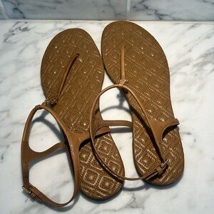 Tory Burch Tan and gold flat sandal with adjustable ankle strap